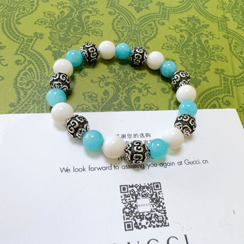 G*u*i bracelets